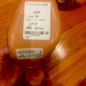 New.. look at the tag. Bought at Nordstrom rack last year.